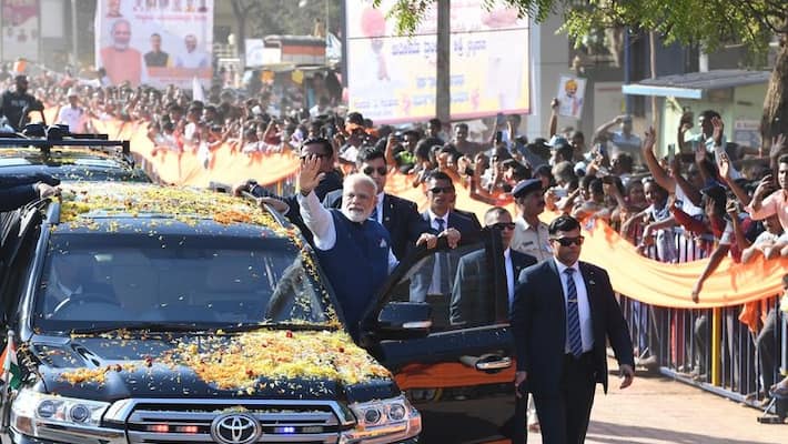 Boy Runs To PM Modi's Car In Karnataka, police says Action Will Be Taken Boy Runs To PM Modi's Car In Karnataka, police says Action Will Be Taken