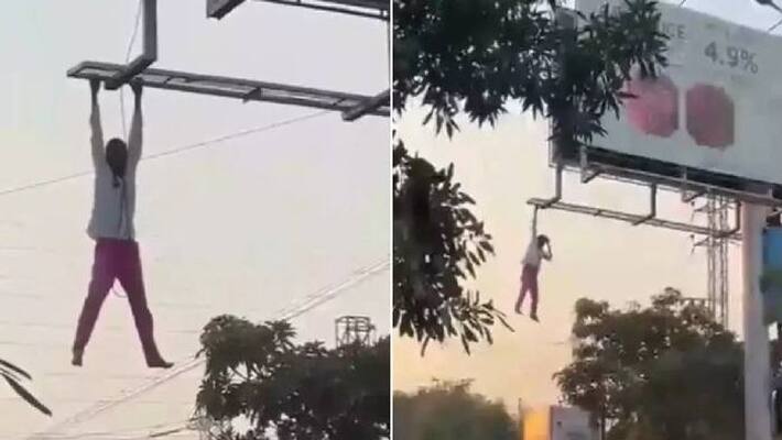 drunk man hang in billboard drunk man hang in billboard