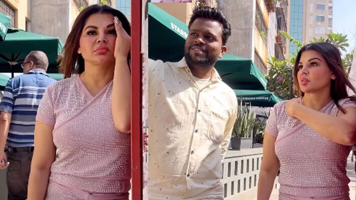 Rakhi Sawant says Please go far away as her fan tries to click selfie with her Rakhi Sawant says Please go far away as her fan tries to click selfie with her