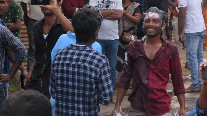 tamilian protestor pulls out shampoos as force fires water cannons in srilankas jaffna dist tamilian protestor pulls out shampoos as force fires water cannons in srilankas jaffna dist