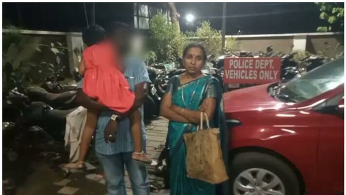 housewife s strike with kid late at night in front of esaf bank at kochi housewife s strike with kid late at night in front of esaf bank at kochi