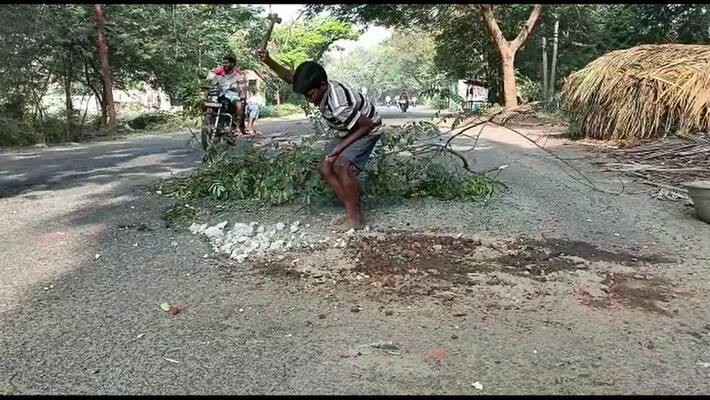 8th standard student repairing a damaged road in puducherry 8th standard student repairing a damaged road in puducherry