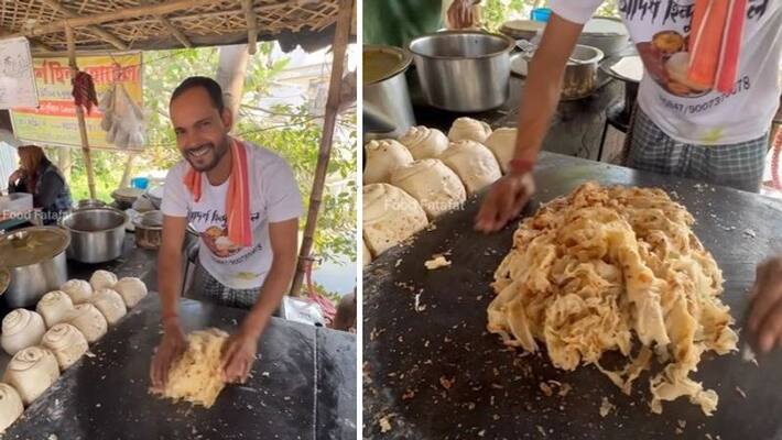 street food vendor makes paratha in a unique style street food vendor makes paratha in a unique style