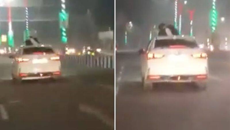 A couple of romance atop moving car in cold Lucknow video goes viral 