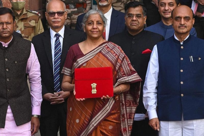 Sitharaman brings a tablet in a red bag to Parliament to introduce a paperless budget.