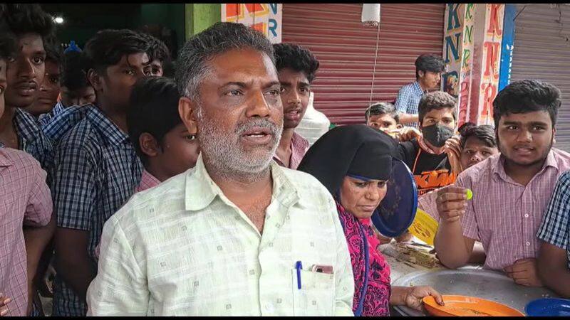 a shop owner selling a biryani half rate for school students in hosur