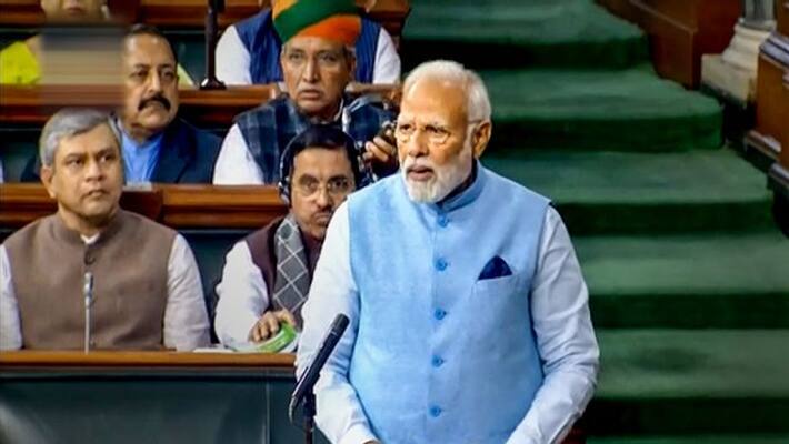 opposition demands pm modi reaction on adani issue, pm modi talks in loksabha about scams in congress led regime