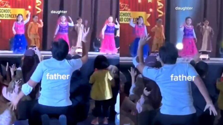 Father enacts dance steps for daughter during performance at school azn Father enacts dance steps for daughter during performance at school azn