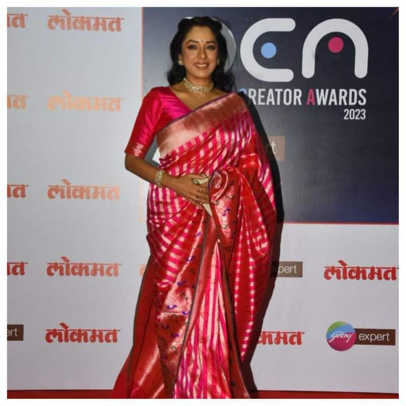Rupali Ganguly turns ravishing in sheer vermillion red saree and
