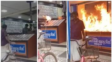 young man poured petrol on the lottery shop and set it on fire vcd young man poured petrol on the lottery shop and set it on fire vcd