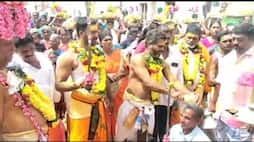 Hundreds of devotees break coconuts on their heads at the Salem Temple Festival