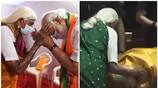 PM narendra Modi touches feet of 107 year old grandmother Pappammal  in the Millets conference san