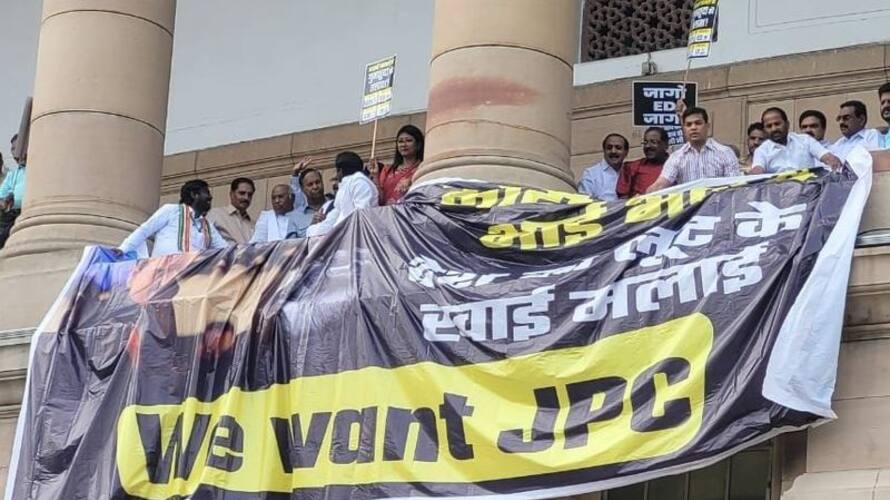 Opposition MPs protest on first floor of Parliament, demands JPC on Adani Group issue Opposition MPs protest on first floor of Parliament, demands JPC on Adani Group issue