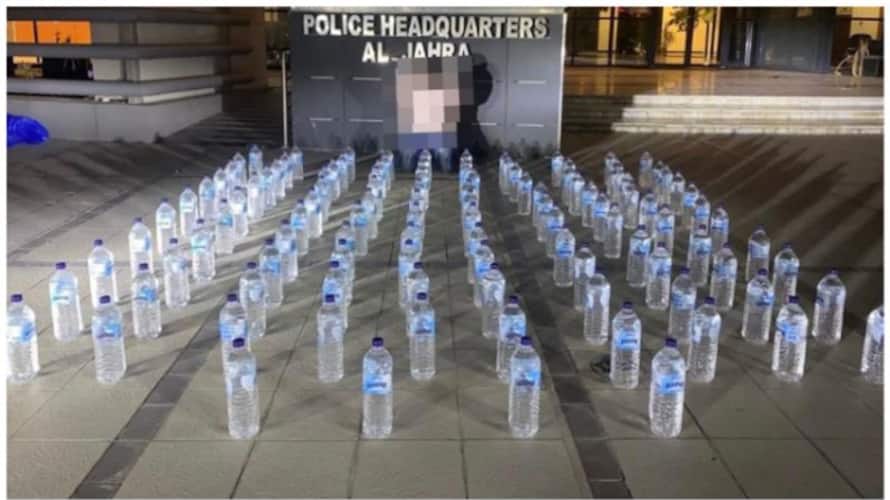 Expatriate youth arrested with 114 bottles of liquor afe Expatriate youth arrested with 114 bottles of liquor afe