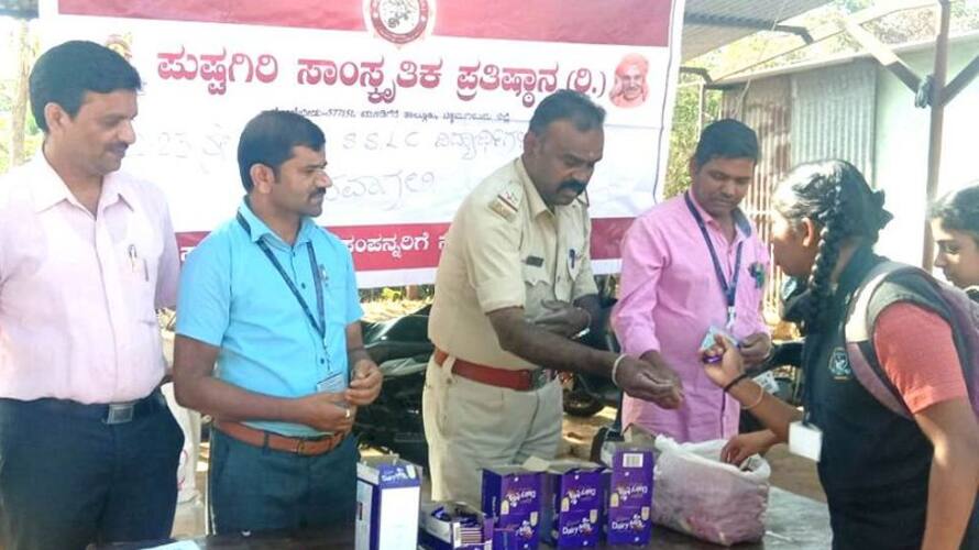 Rose and sweets distributed to SSLC students at exam centres in chikkamagaluru gvd Rose and sweets distributed to SSLC students at exam centres in chikkamagaluru gvd