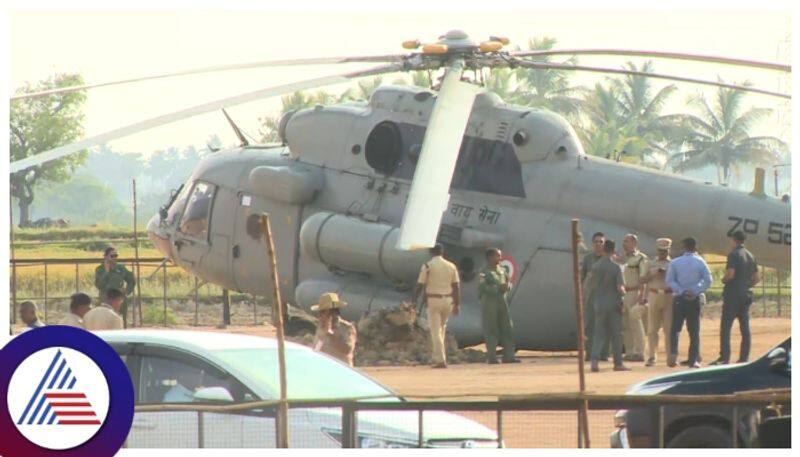 Prime Minister Modi security force helicopter stuck in a paddy field Struggle to lift sat