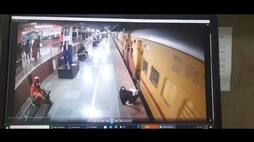 railway police rescue a passenger who fall down from train in salem railway station