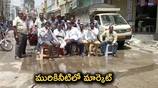 Merchants are protesting against a drainage problem at the market in Godavari Khani 