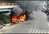 A car is burning under the Adyar flyover in chennai