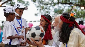 PM Modi interacted with tribal leaders, football players in Pakaria village PM Modi interacted with tribal leaders, football players in Pakaria village