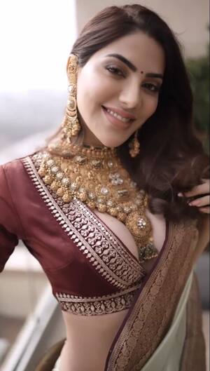 Nikki Tamboli came wearing such a deep neck revealing blouse with