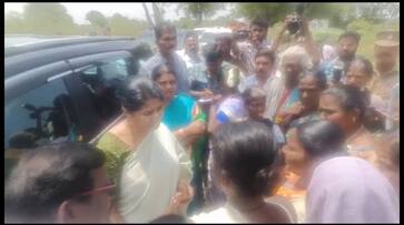 Villagers demand to block MP Kanimozhi's vehicle for drinking water in Thoothukudi Villagers demand to block MP Kanimozhi's vehicle for drinking water in Thoothukudi