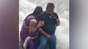 Woman drowns in sea while taking picture with husband in mumbai Woman drowns in sea while taking picture with husband in mumbai