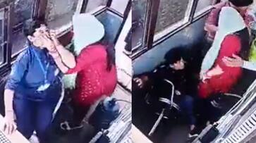 Women Threatened pulled hair of Toll Plaza Female employee in greater noida Women Threatened pulled hair of Toll Plaza Female employee in greater noida