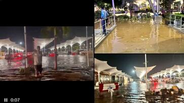 Rain disaster in Gujarat: Ahmedabad airport flooded, passengers wade through knee-deep water RMA Rain disaster in Gujarat: Ahmedabad airport flooded, passengers wade through knee-deep water RMA