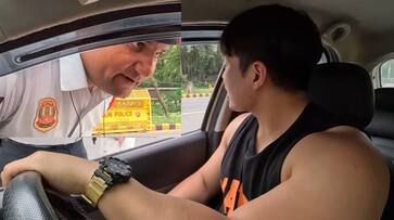 viral video Delhi traffic police suspended for extorting 5000 from a foreign vlogger akb viral video Delhi traffic police suspended for extorting 5000 from a foreign vlogger akb