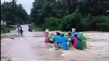 The mother and daughter were washed away in the flood while going home.. The incident in Bhadradri Kottagudem.. Video viral..ISR The mother and daughter were washed away in the flood while going home.. The incident in Bhadradri Kottagudem.. Video viral..ISR