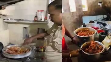 Kerala police Chicken cooking video goes viral Kerala police Chicken cooking video goes viral