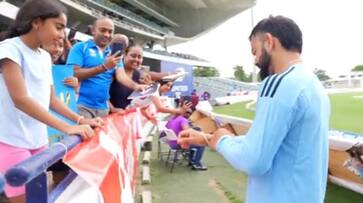 Fan Gifted a bracelet to Indian Cricketer Virat Kohli at Bridgetown, barbados Fan Gifted a bracelet to Indian Cricketer Virat Kohli at Bridgetown, barbados