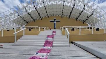 Artist create banknote carpet to slam cost of Popes visit rlp Artist create banknote carpet to slam cost of Popes visit rlp
