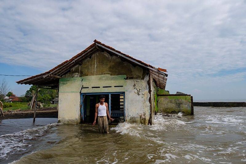 coastline that is momentarily submerged is Tambakrejo in Indonesia bkg