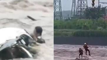 Typhoon Doksuri: Chinese man's car flipped over by flash flood; here's what happened next (WATCH) snt Typhoon Doksuri: Chinese man's car flipped over by flash flood; here's what happened next (WATCH) snt