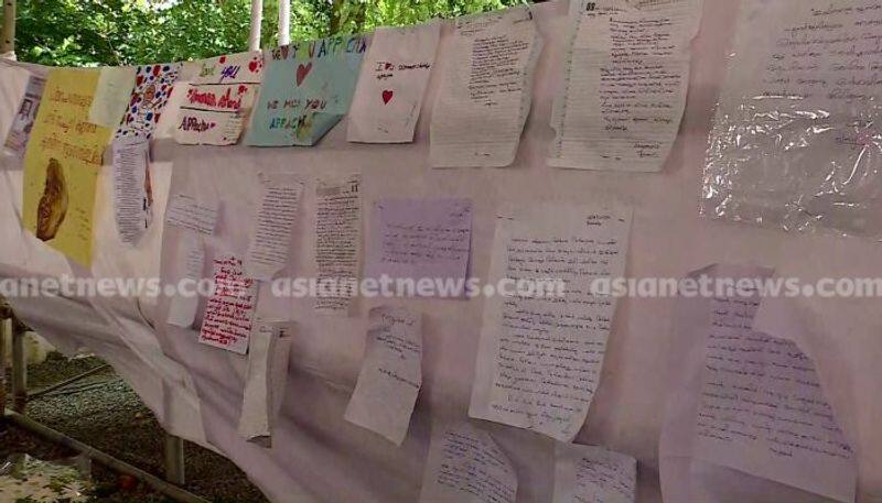 People puts letters as prayer in front of oommen chandy's tomb kgn