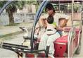 amroha girl pooja ride e rikshaw with her baby tied on her tummy ZKAMN