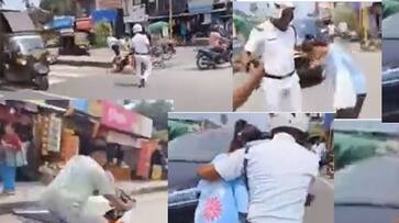Boy left girlfriend behind road to avoid police challan for traffic violation video viral ckm Boy left girlfriend behind road to avoid police challan for traffic violation video viral ckm