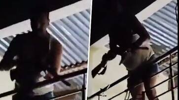 man shoots 8 from balcony 2 dead argument started over pet dogs ash man shoots 8 from balcony 2 dead argument started over pet dogs ash