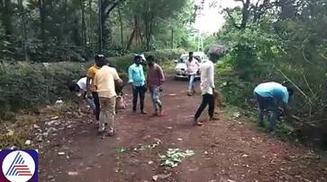 Cops praised for making tourists pick up beer bottles they threw on Kallattagiri Falls road vkp Cops praised for making tourists pick up beer bottles they threw on Kallattagiri Falls road vkp