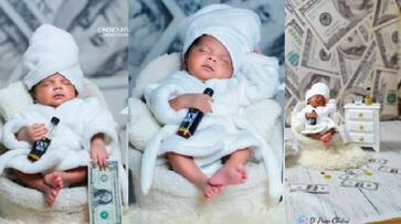 baby photoshoot goes viral in which baby held wisky bottle and dollar in hand akb baby photoshoot goes viral in which baby held wisky bottle and dollar in hand akb
