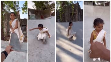 video of a five-year-old girl skating in a Kasavu saree has gone viral bkg video of a five-year-old girl skating in a Kasavu saree has gone viral bkg