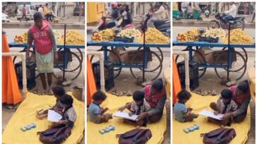 video of the Fruit Seller mother teaching her children Near Roadside Stall goes viral bkg video of the Fruit Seller mother teaching her children Near Roadside Stall goes viral bkg