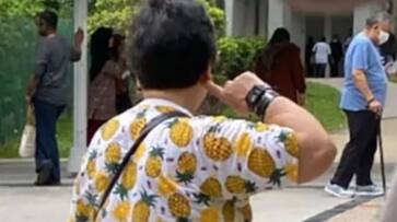 Singapore President Election Women with pineapple shirt not allowed to vote ans Singapore President Election Women with pineapple shirt not allowed to vote ans