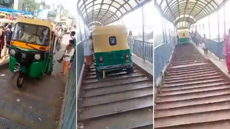 Auto Driver Rides On Foot Over Bridge To Escape Traffic In Delhi, Arrested: video goes viral- rag