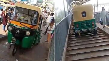 Auto Driver Rides On Foot Over Bridge To Escape Traffic In Delhi, Arrested: video goes viral- rag Auto Driver Rides On Foot Over Bridge To Escape Traffic In Delhi, Arrested: video goes viral- rag