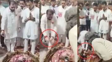 UP Minister faces flak over washing hands in Shivling Argha: video goes viral-rag UP Minister faces flak over washing hands in Shivling Argha: video goes viral-rag
