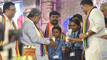 CM Siddaramaiah made children drink milk in Tumakuru gvd CM Siddaramaiah made children drink milk in Tumakuru gvd
