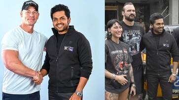 Actor Karthi posted a photo with 13 time WWE champion john cena from Hyderabad ans Actor Karthi posted a photo with 13 time WWE champion john cena from Hyderabad ans